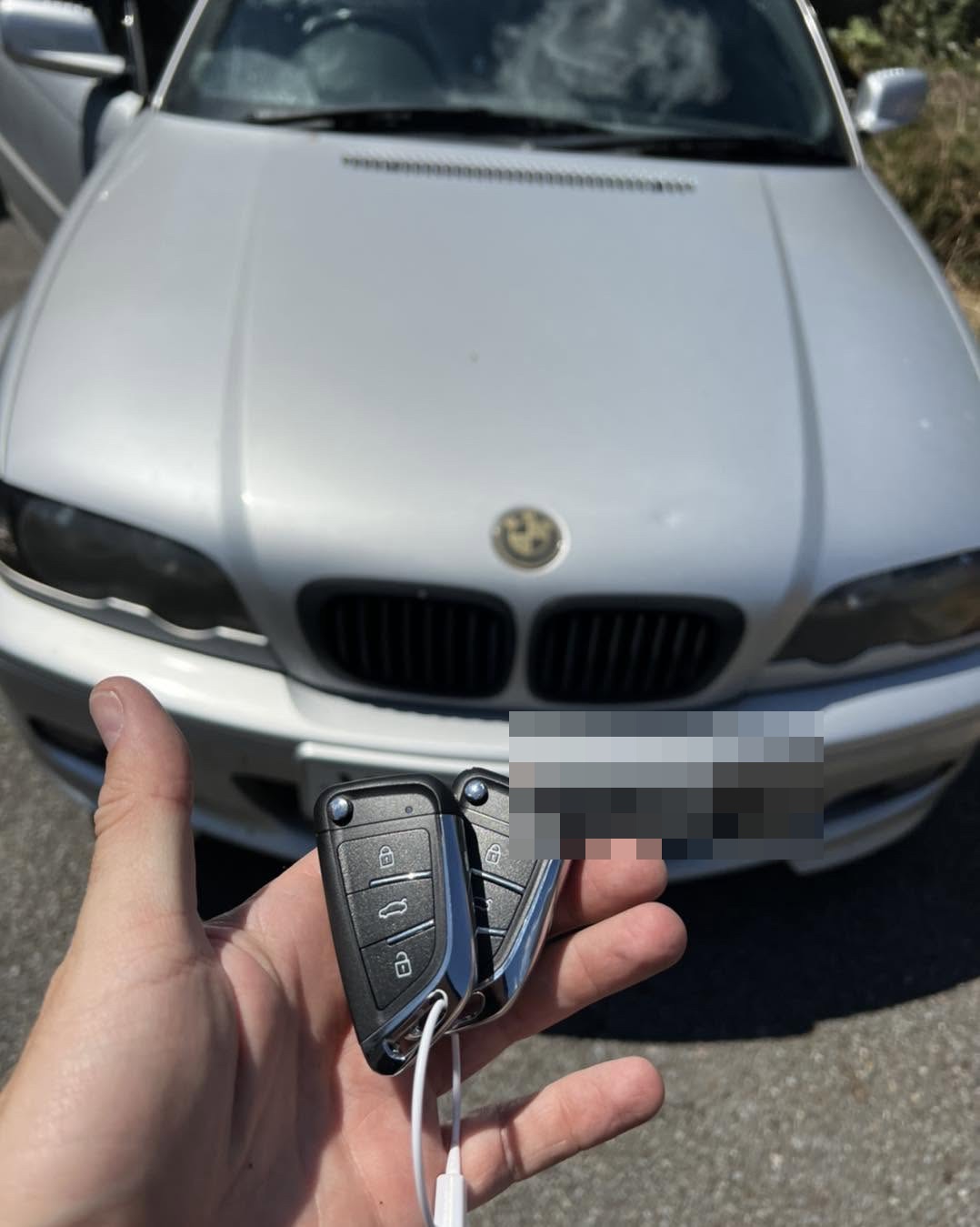 BMW 3 Series replacement key at the vehicle
